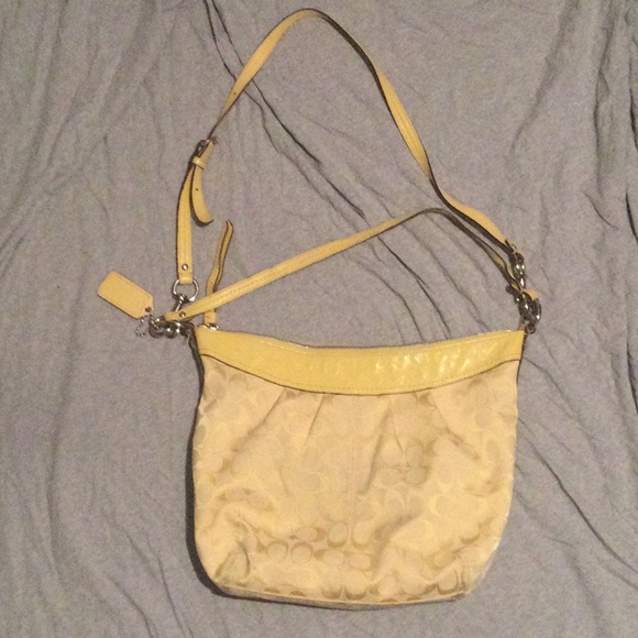 Coach Handbags - Used yellow coach shoulder bag for sale priced at $65 or best offer.